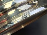 a close up view of a shiny motorcycle tire