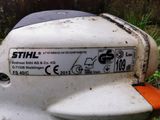 a close up of a white moped with a sticker on it