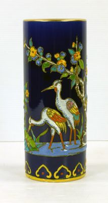 LONGWY, VASE rouleau, à décor d'échassiers en émaux polychro…