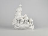 white porcelain figurine of a woman with sheep and a dog