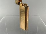 a lighter that is sitting on a clear table