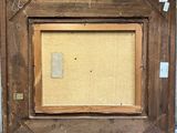 an old picture frame with a picture of a cat in it