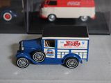 a toy truck that is sitting in front of a display case