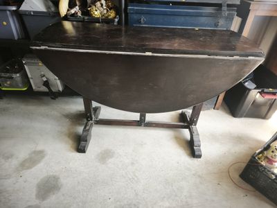 a small table with a picture on top of it
