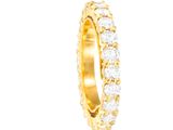 une bague en or jaune sertie d'une rangée de diamants ronds taille brillant