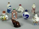 a lot of small vases that are sitting on a table