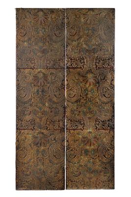 a pair of decorative metal panels with paisley designs on them