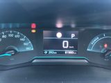 the dashboard of a car with a digital display on it