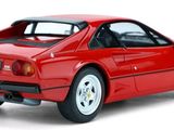 red model of a sports car on a white background