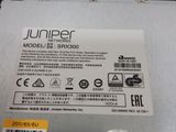 the back side of a laptop with a sticker on it