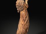 a statue of a woman holding a child in her arms