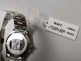 someone is holding a watch with a price tag attached to it