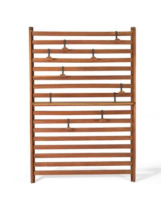 an image of a wooden rack with several bottles on it
