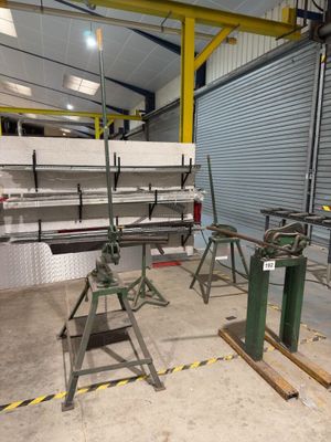 several machines that are sitting in a warehouse
