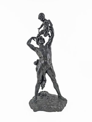 statue of a man holding a child on his shoulders