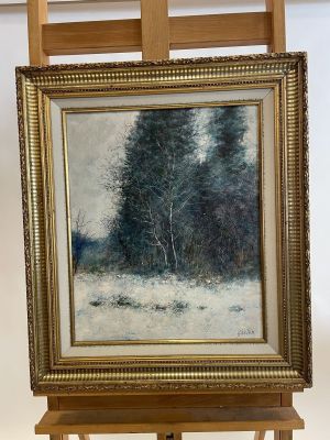 an oil painting of a snowy landscape with trees on a easel