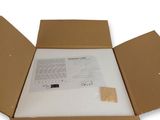 an open cardboard box with a piece of paper inside of it