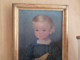 a picture of a little boy with a bird on a table