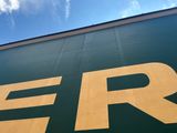 a large sign that says er on the side of a building