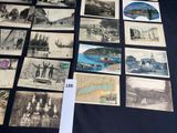 a lot of old postcards that are on the table