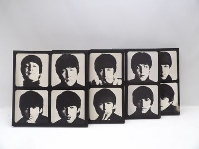 un ensemble de six photographies en noir et blanc des Beatles