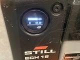 a close up of a parking meter with a clock on it