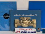 deux livres posés sur la table, sur laquelle se trouve une voiture