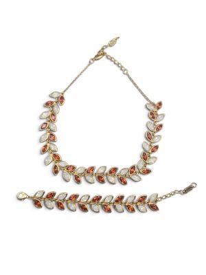 an image of a necklace and bracelet set on a white background