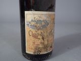 a bottle of wine that is sitting on a table