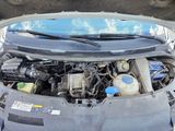a car that has its hood open with the hood up