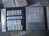 a lot of different stamps on the pages of a book