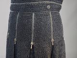 a close up of a mannequin skirt with zippers on it