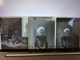 two old black and white photos of a woman and a dog