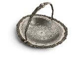 an antique silver plate with a handle on a white background