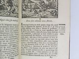 an open book with a picture of a man on horseback