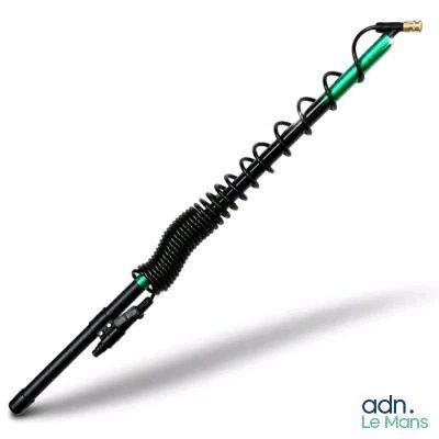 une image représentant un stylo noir et vert avec un manche vert