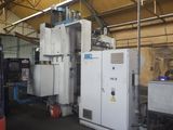 a large machine that is sitting inside of a building