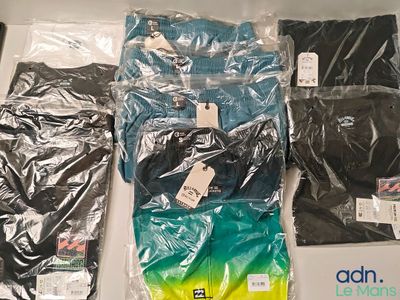 a box of assorted clothing sitting on a table