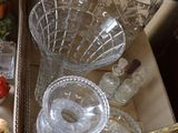 a box with a variety of glassware in it