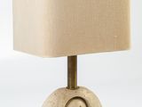 beige table lamp with a beige shade on a white background