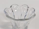 a clear glass bowl with a decorative design on it
