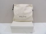 the pouch is sitting on top of the box on the table