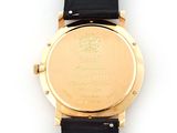 an image of a close up of a watch on a white surface