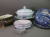 several different types of blue and white dishes and dishes on a table
