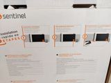 a box with instructions on how to install a microwave