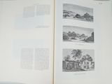 an open book with a picture of a beach and mountains in the background