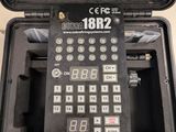 a black case with a bunch of buttons inside of it