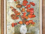 tableau représentant des fleurs rouges dans un vase blanc posé sur une table