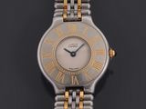 a lady ' s wrist watch with two tone gold roman numerals