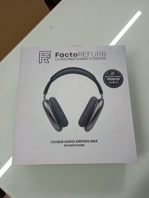 packaging of a pair of headphones sitting on top of a glass table